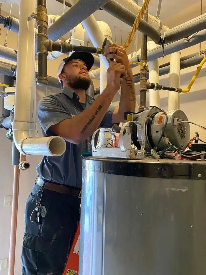 Gas Safe engineer servicing a boiler